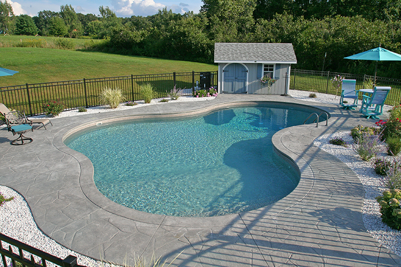 Swimming pool and stamped concrete project example 220